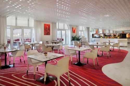 Imagen de la habitación del Hotel Raffles The Palm Dubai. Foto 14