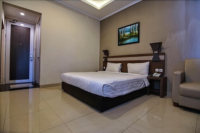 Imagen de la habitación del Hotel Raffleshom. Foto 8