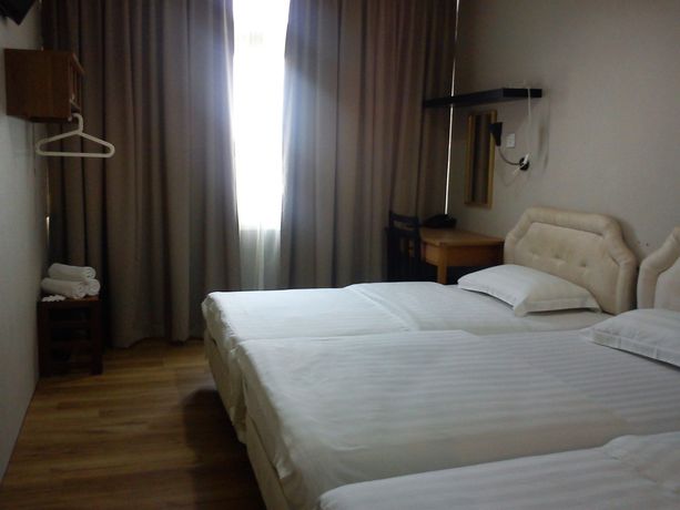 Imagen de la habitación del Hotel Rafflesia Inn. Foto 1