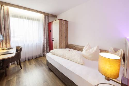 Imagen de la habitación del Hotel Raffl's. Foto 7