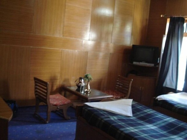 Imagen de la habitación del Hotel Rafica. Foto 15