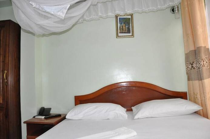 Imagen de la habitación del Hotel Rafiki Inn. Foto 17