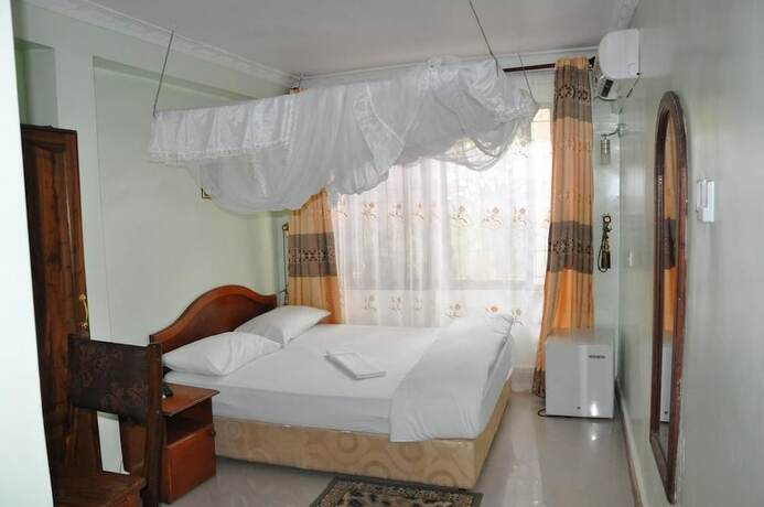 Imagen de la habitación del Hotel Rafiki Inn. Foto 18