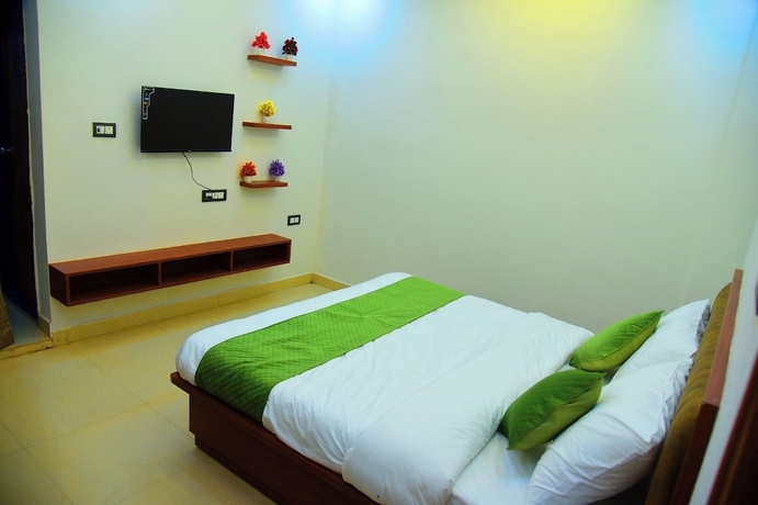 Imagen de la habitación del Hotel Raghav Inn. Foto 6