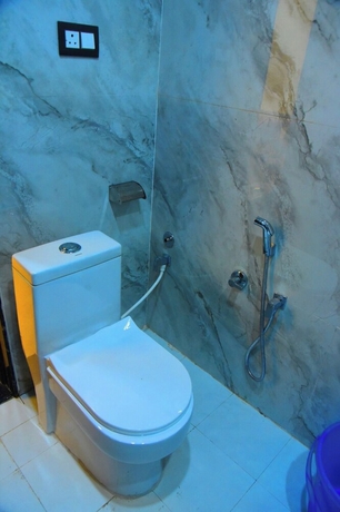 Imagen de la habitación del Hotel Raghav Inn. Foto 8