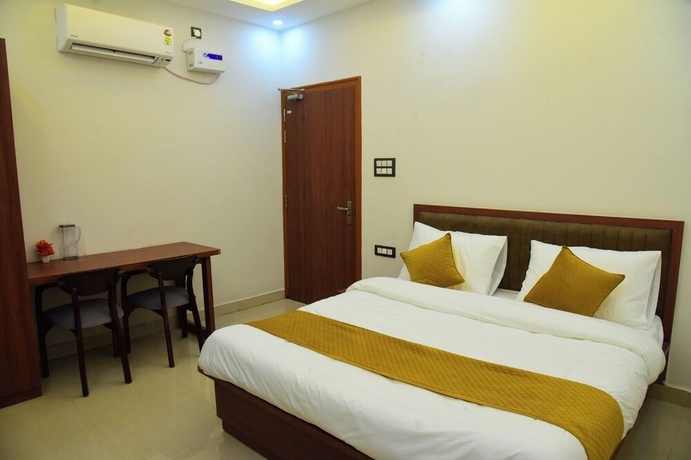 Imagen de la habitación del Hotel Raghav Inn. Foto 9