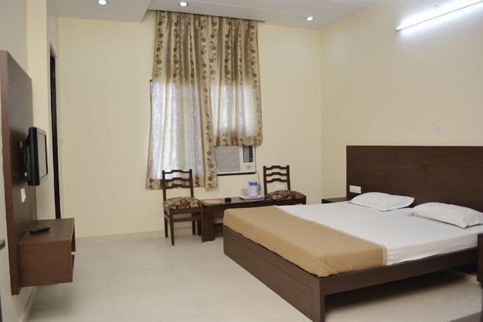 Imagen de la habitación del Hotel Raghav Palace. Foto 5