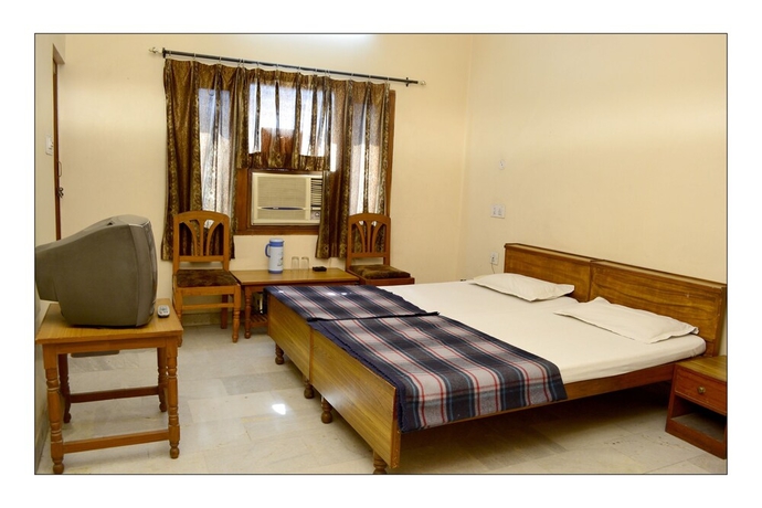 Imagen de la habitación del Hotel Raghav Palace. Foto 7