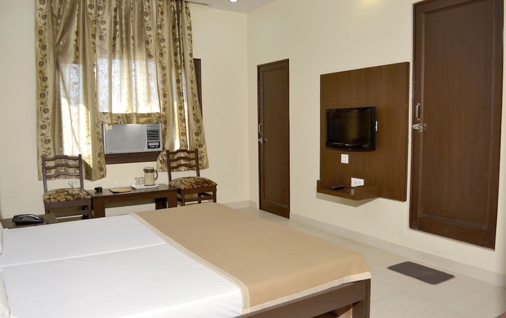 Imagen de la habitación del Hotel Raghav Palace. Foto 8