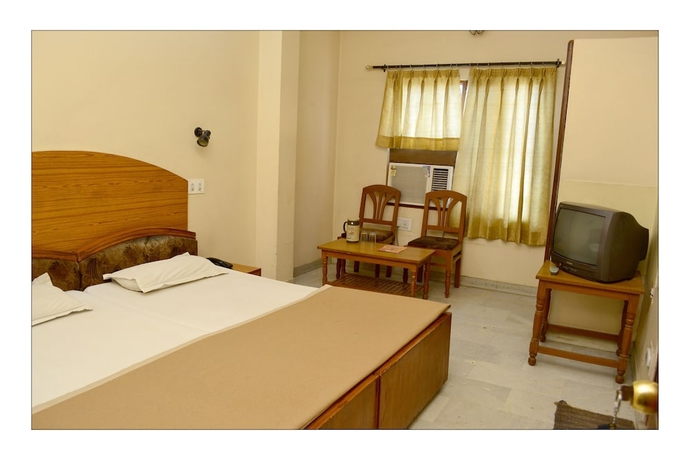 Imagen de la habitación del Hotel Raghav Palace. Foto 9
