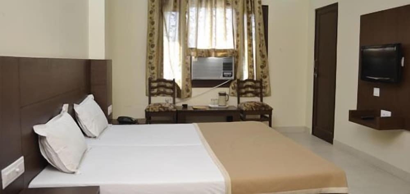 Imagen de la habitación del Hotel Raghav Palace. Foto 11