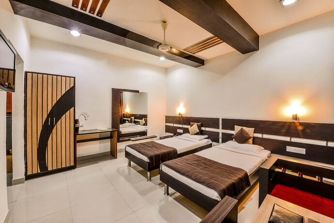 Imagen de la habitación del Hotel Raghu Mahal. Foto 18