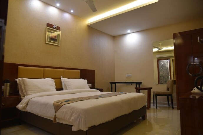 Imagen de la habitación del Hotel Raghu Mahal. Foto 35