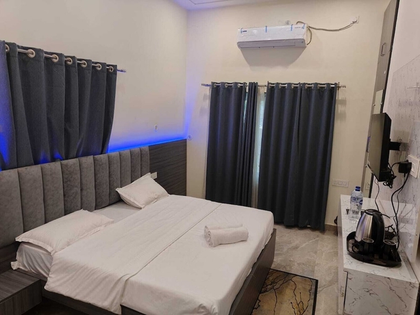 Imagen de la habitación del Hotel Raghupati Raghav Raja Ram Inn. Foto 10