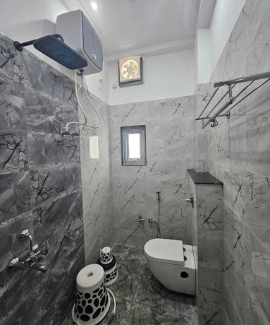 Imagen de la habitación del Hotel Raghupati Raghav Raja Ram Inn. Foto 13