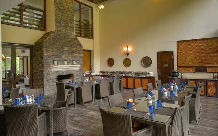 Imagen del bar/restaurante del Hotel Rah Villas. Foto 7