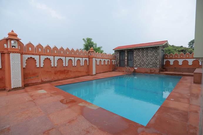 Imagen de la piscina del Hotel Raha, Udaipur. Foto 19