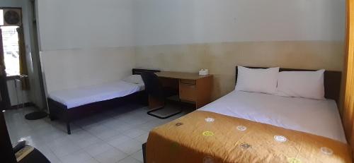 Imagen de la habitación del Hotel Rahayu Ciberon. Foto 4