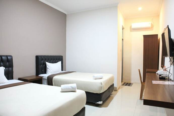 Imagen de la habitación del Hotel Rahayu Cirebon. Foto 18