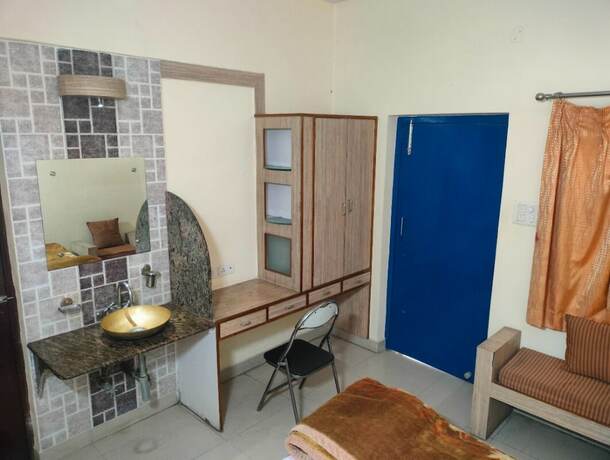 Imagen de la habitación del Hotel Rahul Guest House. Foto 14