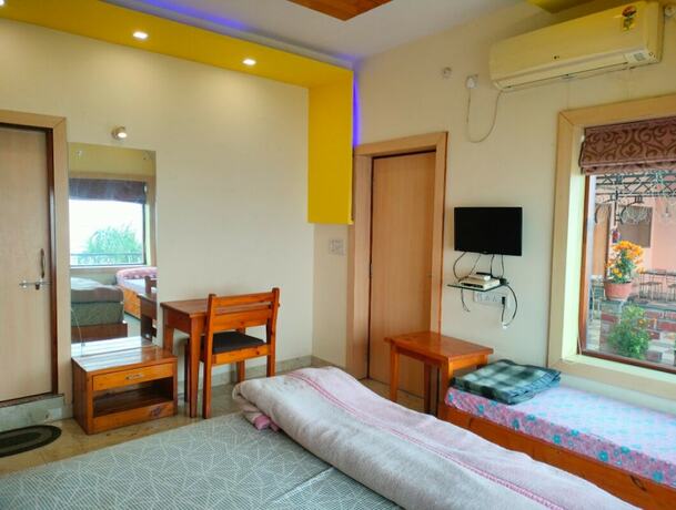Imagen de la habitación del Hotel Rahul Guest House. Foto 19