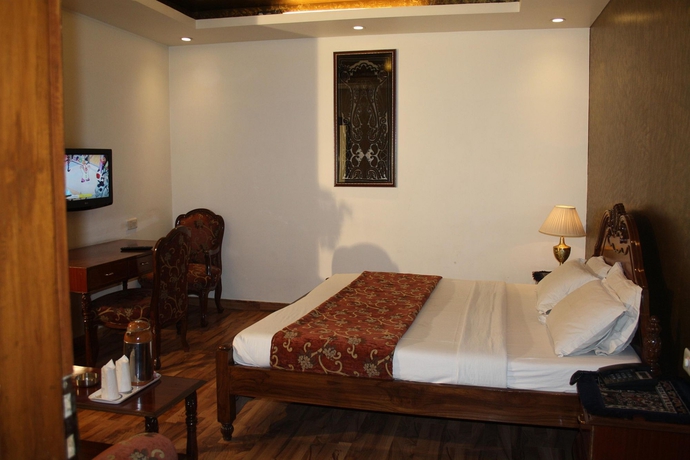Imagen de la habitación del Hotel Rahul Palace. Foto 7