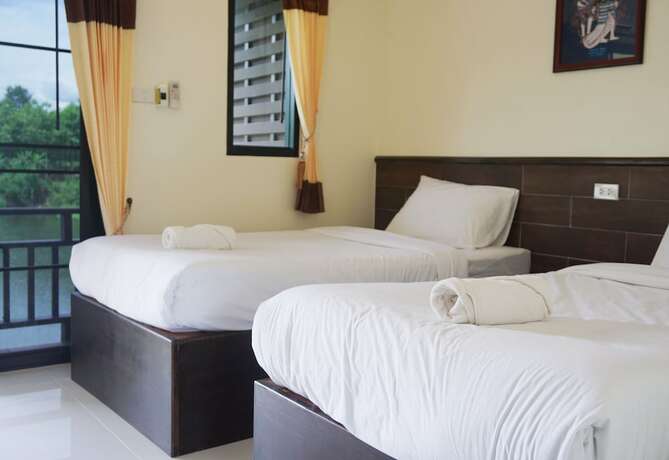 Imagen de la habitación del Hotel Rai Juthamas Resort. Foto 19
