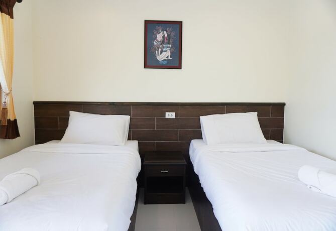 Imagen de la habitación del Hotel Rai Juthamas Resort. Foto 20