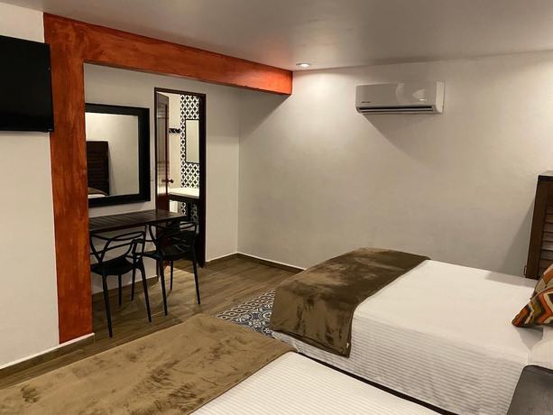 Imagen de la habitación del Hotel Ra&iacute;ces de Mar. Foto 15