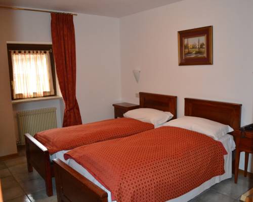 Imagen de la habitación del Hotel Raibl Appartamenti. Foto 6