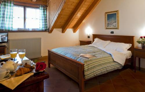 Imagen de la habitación del Hotel Raibl Appartamenti. Foto 15