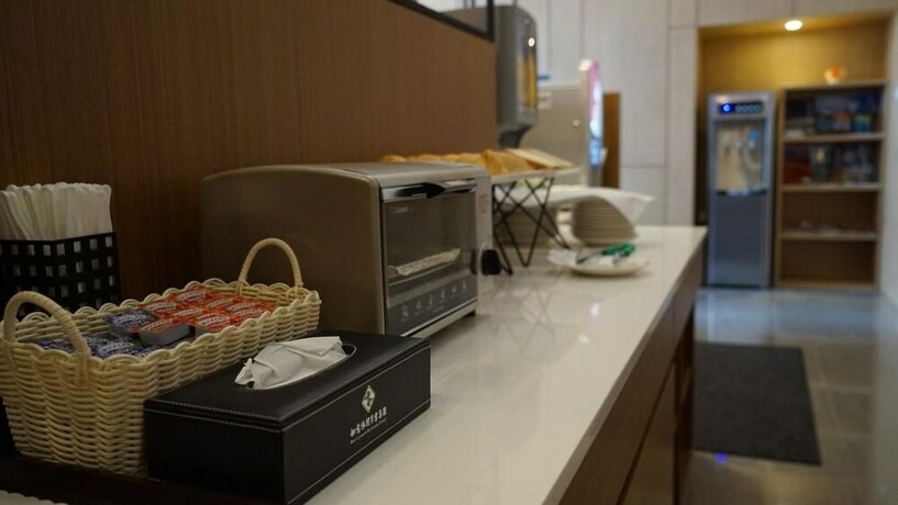 Imagen del bar/restaurante del Hotel Railway Inn, Taitung. Foto 16