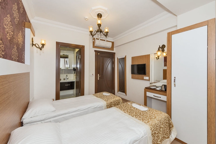 Imagen de la habitación del Hotel Raimond. Foto 11