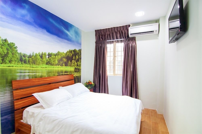 Imagen de la habitación del Hotel Rain Forest. Foto 7