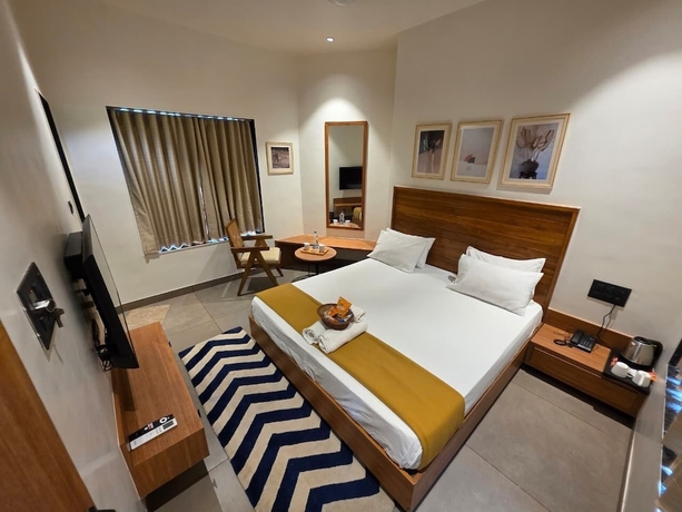 Imagen de la habitación del Hotel Rain Forest Gir Resort. Foto 4