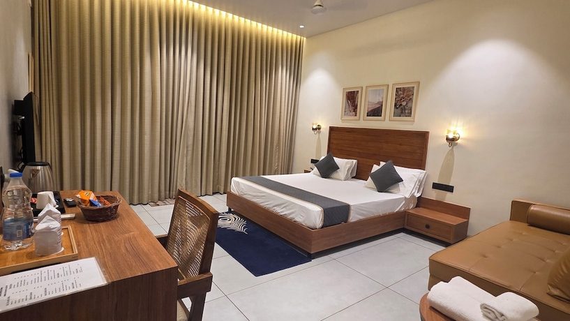 Imagen de la habitación del Hotel Rain Forest Gir Resort. Foto 6