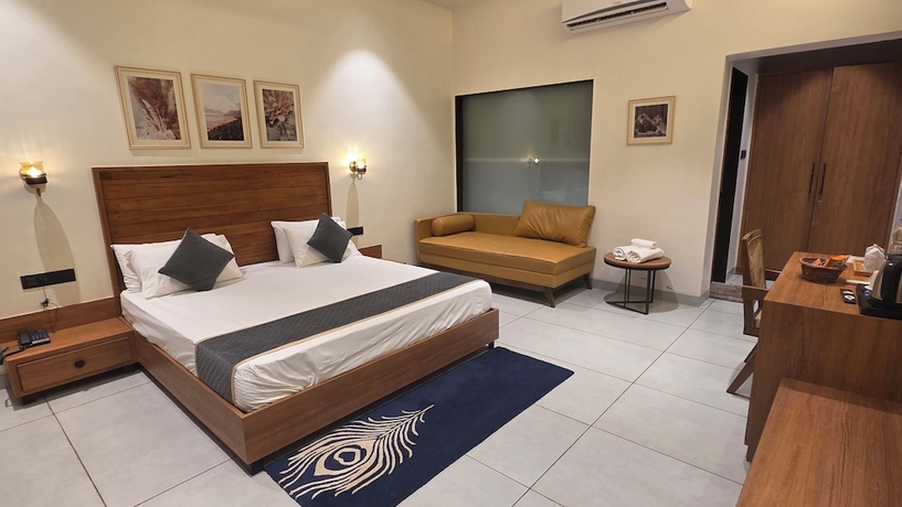 Imagen de la habitación del Hotel Rain Forest Gir Resort. Foto 7