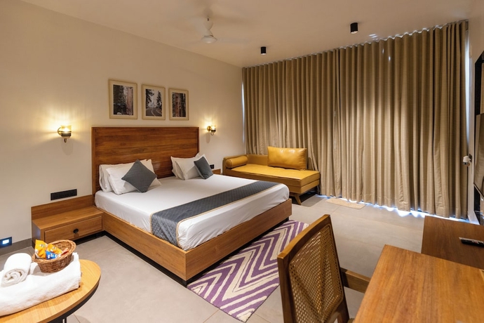 Imagen de la habitación del Hotel Rain Forest Gir Resort. Foto 8