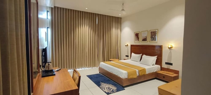 Imagen de la habitación del Hotel Rain Forest Gir Resort. Foto 9