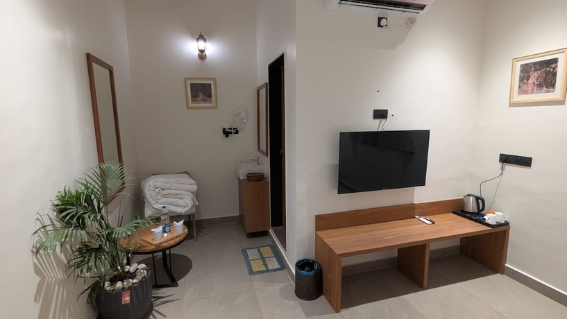 Imagen de la habitación del Hotel Rain Forest Gir Resort. Foto 15
