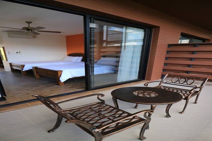 Imagen de la habitación del Hotel Rain Tree Residence. Foto 7