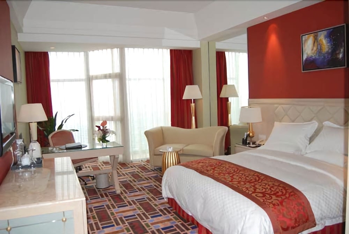Imagen de la habitación del Hotel Rainbird International. Foto 12