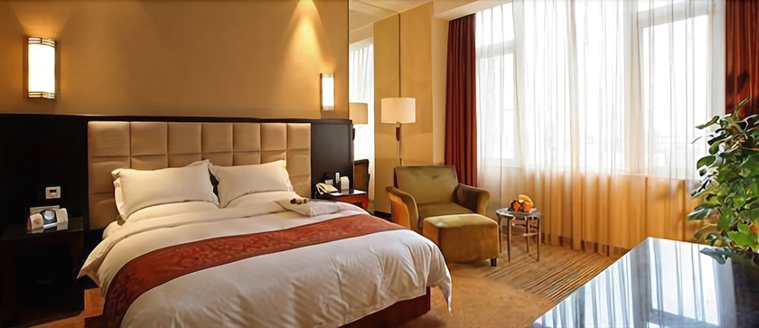 Imagen de la habitación del Hotel Rainbird International. Foto 16