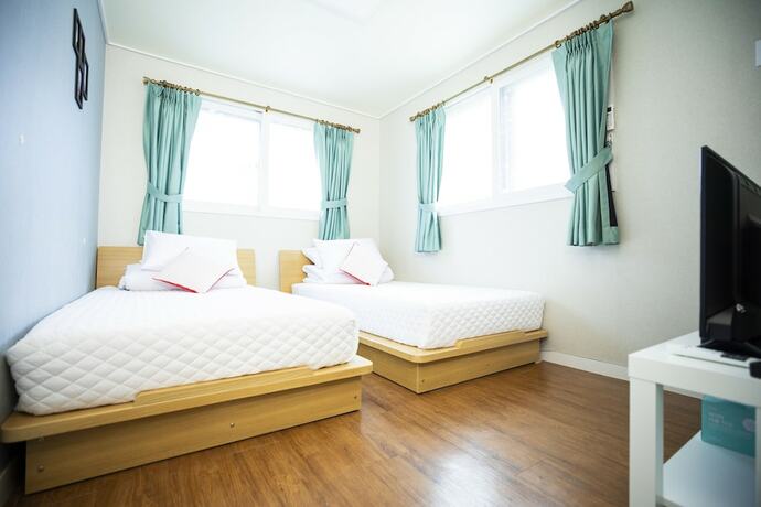 Imagen de la habitación del Hotel Rainbootsguesthouse. Foto 11