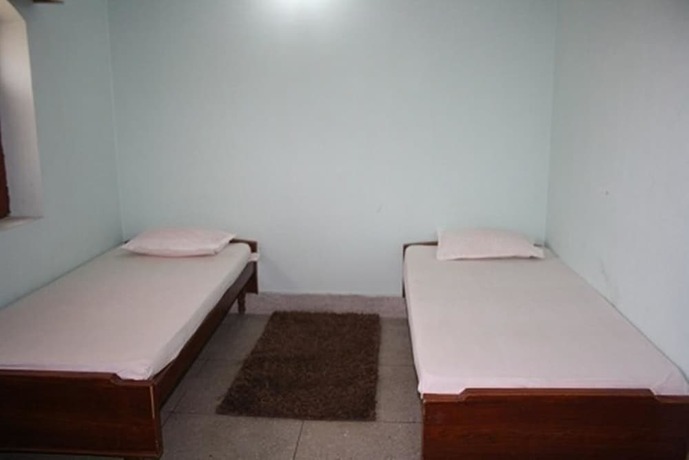 Imagen de la habitación del Hotel Rainbow Guest House, Bodhgaya. Foto 15