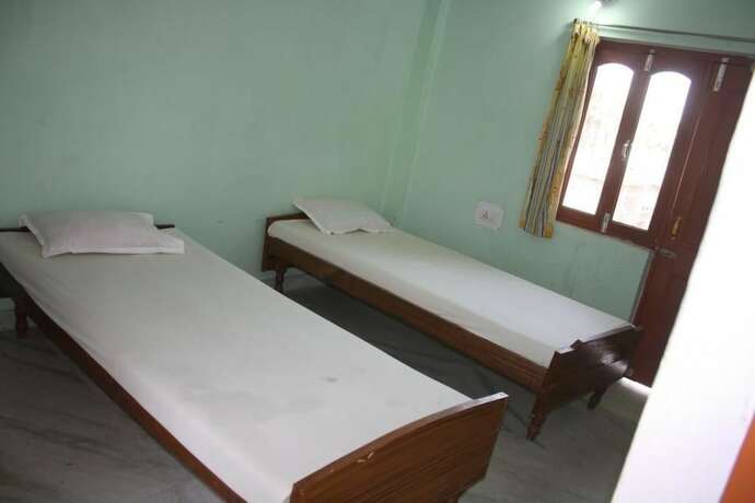 Imagen de la habitación del Hotel Rainbow Guest House, Bodhgaya. Foto 16