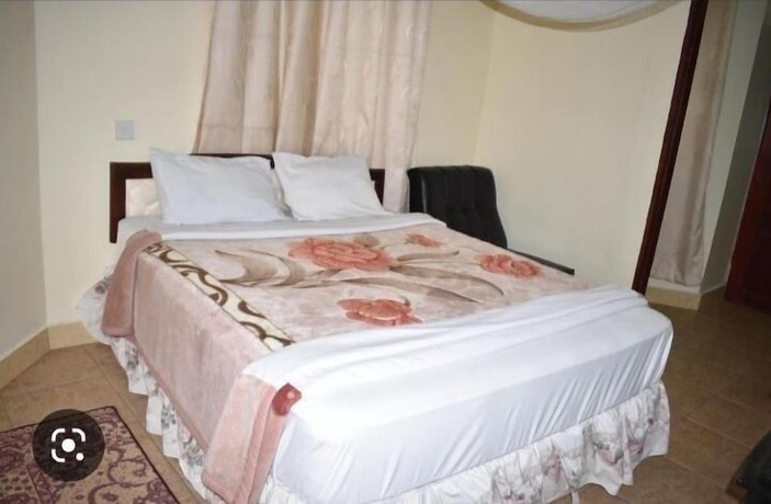 Imagen de la habitación del Hotel Rainbow Lodge, Boma la Ngombe. Foto 5