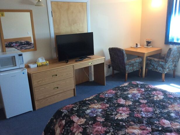 Imagen de la habitación del Hotel Rainbow Motel. Foto 13