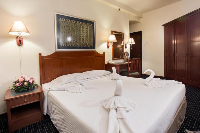 Imagen de la habitación del Hotel Rainbow Paradise Beach Resort. Foto 15