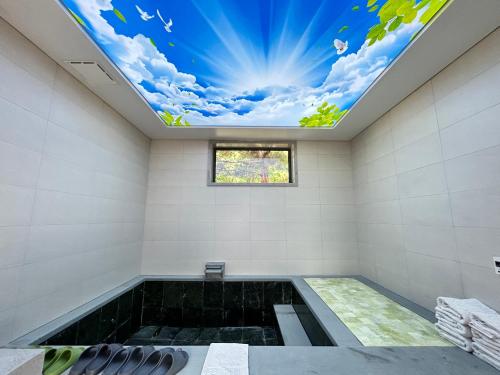 Imagen de la habitación del Hotel Rainbow Valley Hot Spring. Foto 20